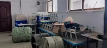 变卖 界首**服饰有限公司所有的位于界首市大黄镇致富路西段100米路南机器设备一批